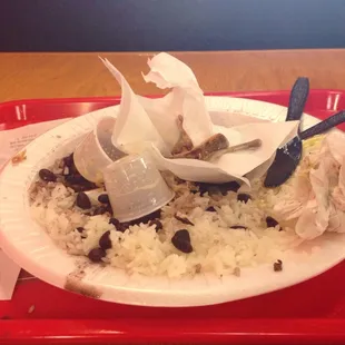 So damn good I forgot to get the picture before I ate it all. Quarter chicken rice and black beans all gone