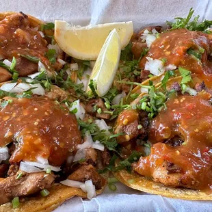 Four chicken tacos with the fixin&apos;s