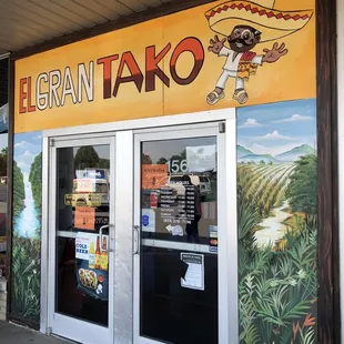 the entrance to a mexican restaurant