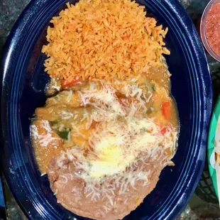 Green Chili Relleno with spanish rice and refried beans, was very good.