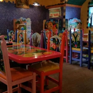 a brightly decorated dining room