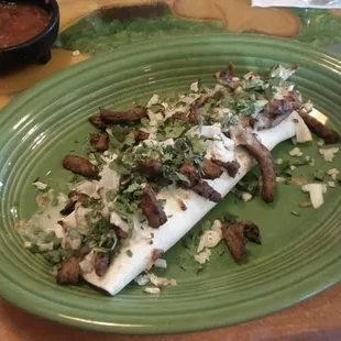 Inside out steak burrito... Love the Fiesta plates