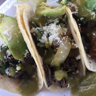 Beef fajita (left) and al pastor tacos(right)