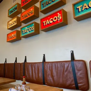 Taco signs in seating area