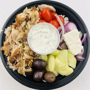 Chicken Gyro Bowl $14.95 Chicken gyro on a bed of rice with tomatoes, cucumbers, olives, onions, feta cheese, &amp; El Greco sauce