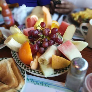 a plate of fruit on a table