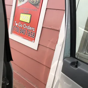 a picture of a sign on the side of a building