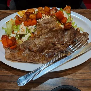 Enchilada platter with steak