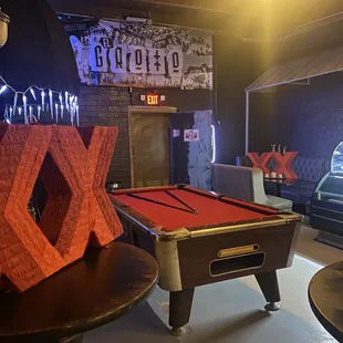 a pool table in a bar