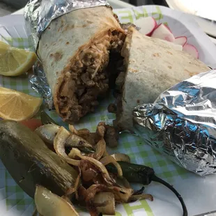 Burrito. Filled with choice of meat, rice, beans, onions, cilantro &amp; hot or mild sauce. Supreme and super also available.