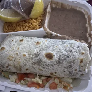 Burrito especial. Very tasty but I was given more than one tiny sauce