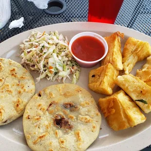 2 pupusas and fried yuca