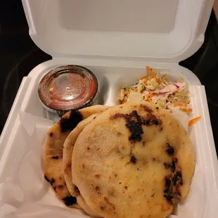 Three pupusas with the crunchy slaw. Make sure to put the slaw on top of pupusa! I usually hate coleslaw but theirs is so good.