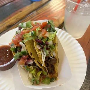 Ground beef tacos.  Just the way my husband likes them.  Not too spicy. Ask for the southwest dressing for a less spicy experience.
