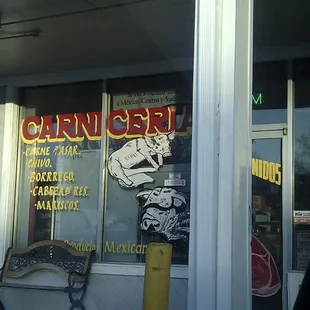 a bench in front of a store