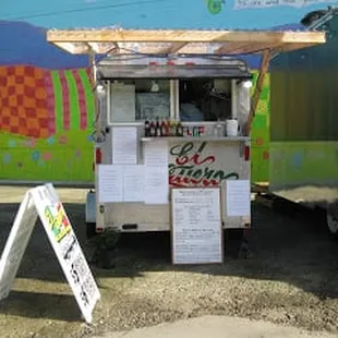 a food truck parked in front of a building
