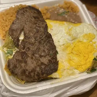 a meal in a styrofoam container