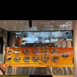 a food truck with menus