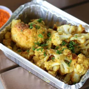 Spice Roasted Cauliflower ($14 large) - cauliflower florets w/ rice and chickpea flour coating, served w/ harissa dip