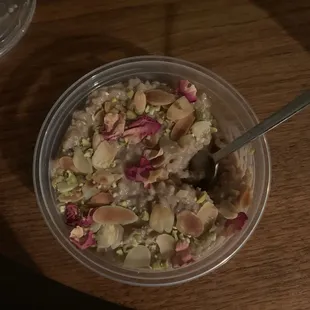 Black tea rice pudding. Sprinkled with pistachios and rose petals!