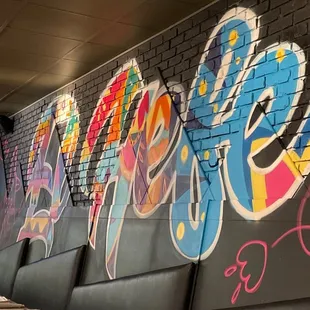 graffiti on the wall of a restaurant
