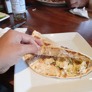 Baleada. My brother suggests adding plátano. But super.cheao and super filling.