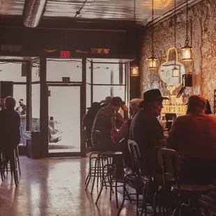 people sitting at a bar