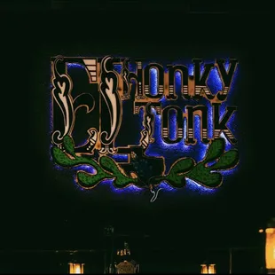 the neon sign for the restaurant