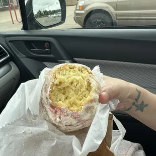 Beso. 2 pound cake biscuits sandwiched with cream and rolled in butter and sugar