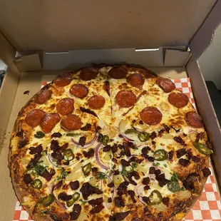 Medium pizza: half Pepperoni half Al Pastor