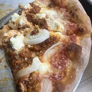 #11 House made chorizo, onions, and goat cheese