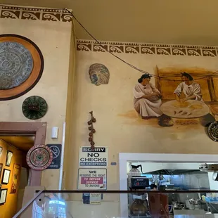 a woman and a man sitting on a bench