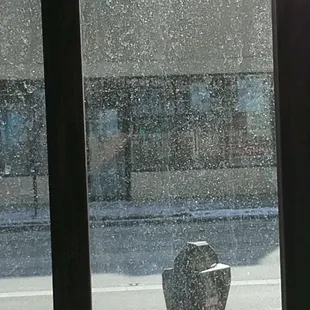 a view of a street through a window