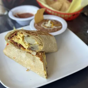 Bacon breakfast burrito beans on the side