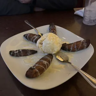 a plate of hot dogs and ice cream