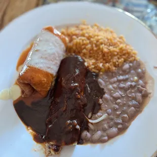 Combination, lunch, one chimichanga, and one enchilada with rice and beans