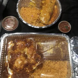 Huevos rancheros, salsa, chicken enchiladas, beans, and Mexican rice