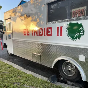 a food truck parked on the side of the road