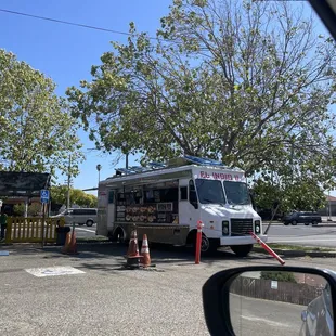 a food truck in a parking lot