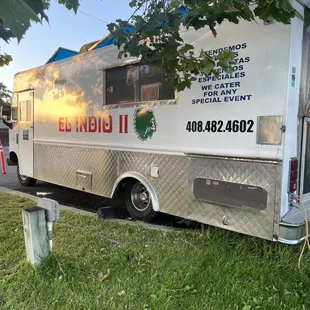 a food truck parked on the side of the road