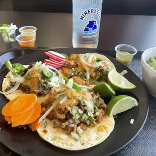 Various tacos, side of pico and the salsa bar delights