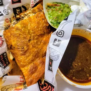 Birriaquesadilla with guacamole, sour cream, and consommé (good but I prefer the tacos)