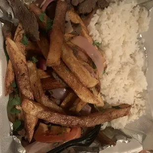 Lomo saltado. Lots of fries