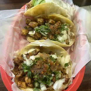 Two regular chicken tacos, and one crispy taco.