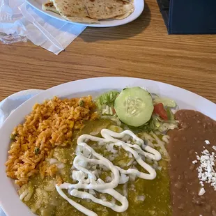 Cheese enchiladas, Verdes  Kids plate in the back, cheese quesadilla with red rice