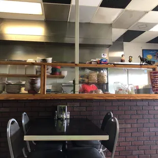 a view of a restaurant counter