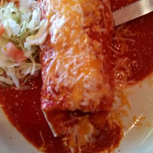 Red Chile con Carne smothered burrito at El Jacalito. Spicy and delicious.