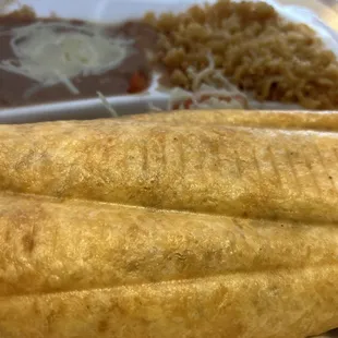 Chicken chimichanga with rice, beans and horchata