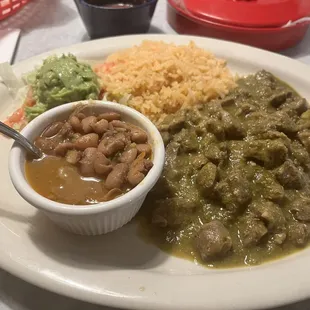 Guisado salsa verde with charro beans.