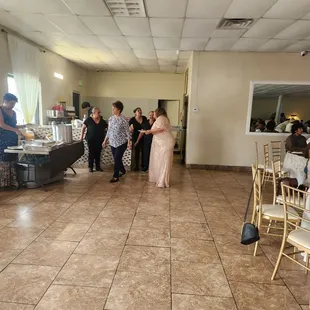 Once you enter the hall, to the left was the mini bar and where food was at